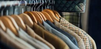 Luxury Winter Jackets: Premium Warmth with Timeless Style A rack of hanging jackets and coats on wooden hangers, showing a variety of fabrics and colors.Luxury Winter Jackets: