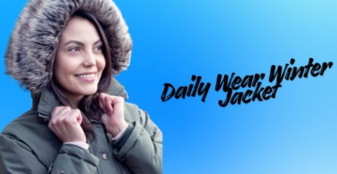 A smiling woman wearing a warm, hooded winter jacket with a fur-trimmed hood, standing against a bright blue gradient background. The text 