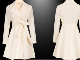 A cream-colored belted coat dress shown from the front and back on a black gradient background. It features a wide lapel, long sleeves, a fabric belt tied at the waist, and a flared A-line skirt. Wedding Topcoat