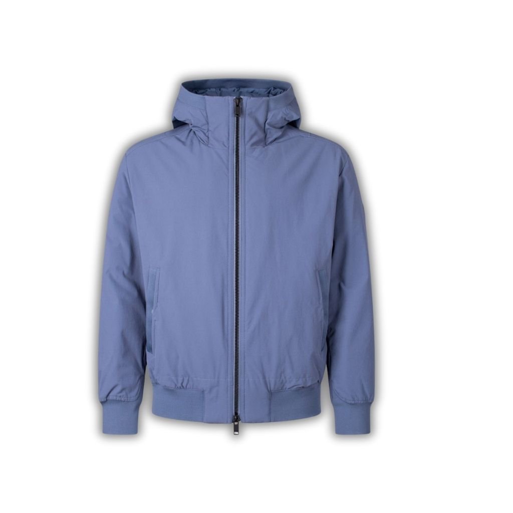A light blue nylon jacket with a full front zipper, hood, and ribbed cuffs and hem. The jacket has two side pockets and a clean, minimalist design.
