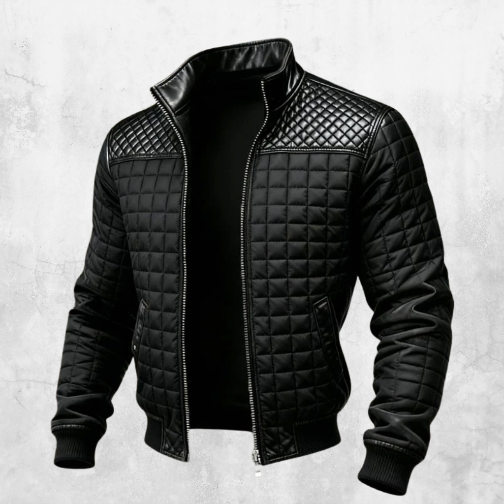 Black quilted jacket with a standing collar and zip closure, featuring quilted panels on the shoulders and sleeves, against a light textured background.