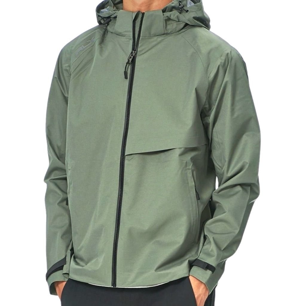 A light olive-green nylon jacket with a full-front black zipper, a high collar with an attached hood, and zippered pockets. The fabric has a smooth, slightly shiny finish and adjustable cuffs.
