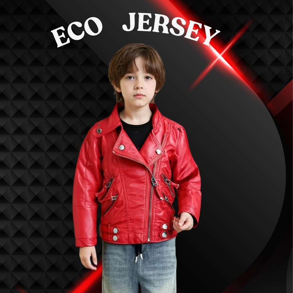 Soft Faux Leather Baby Jacket – Comfortable & Trendy Wear 4 A young boy stands centered in front of a black textured background, wearing a red faux leather jacket over a black shirt and light blue jeans. A red light streak crosses the right side of the image, and the text “ECO JERSEY” appears toward the top.