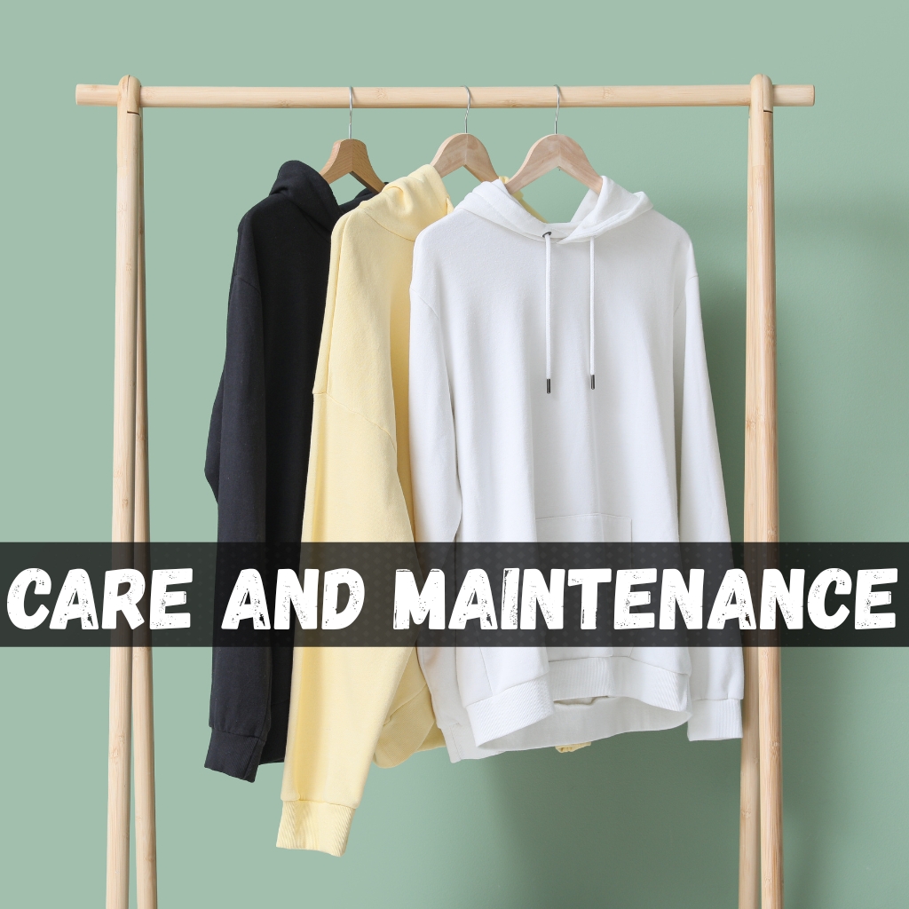 Streetwear Hoodie: Trendy Urban Style for Every Wardrobe 1 Three hoodies in black, yellow, and white hang on wooden hangers from a light wood clothing rack against a pale green background. A bold banner across reads “CARE AND MAINTENANCE.”