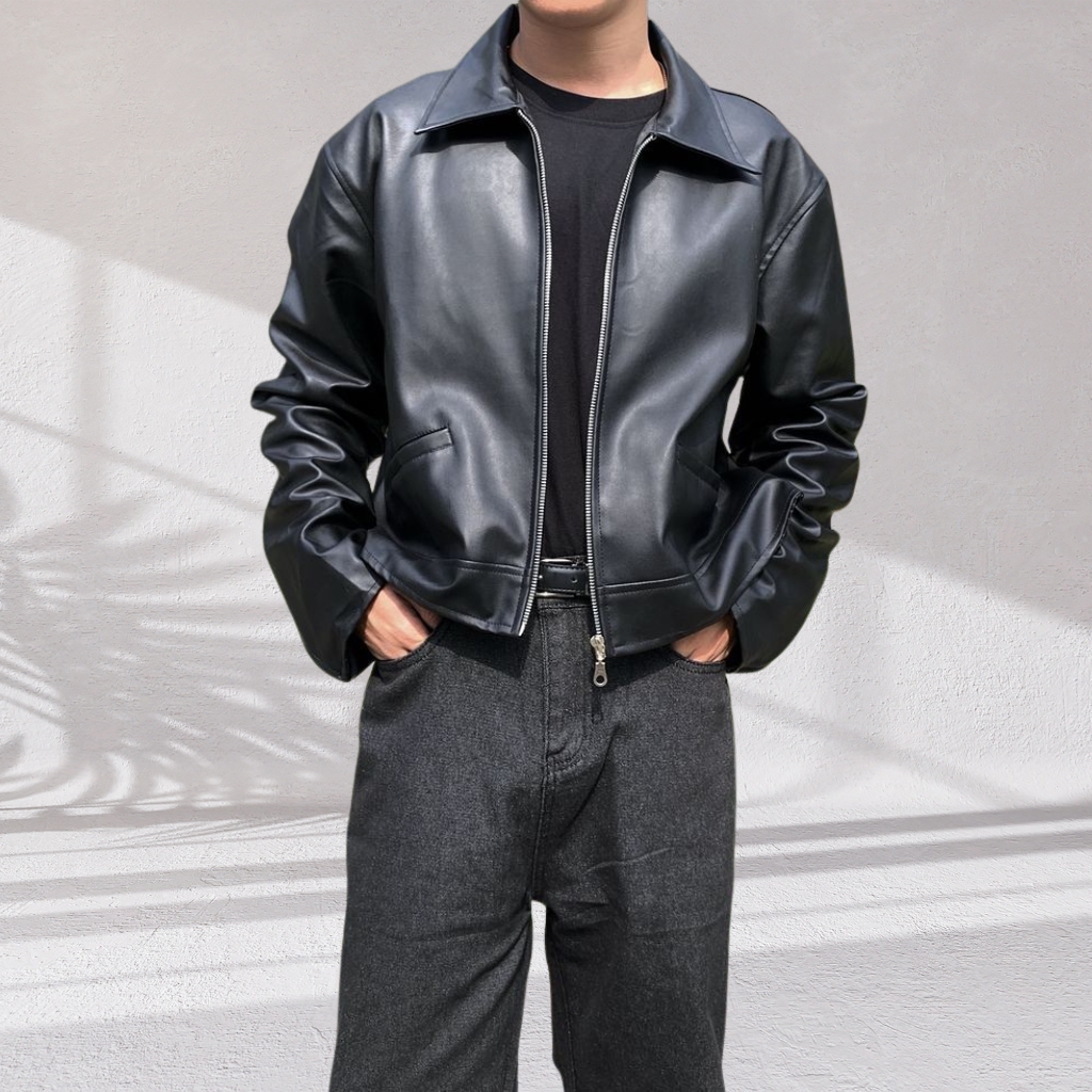 Cargo Leather Jacket For Everyday Utility Fashion 24 A rugged cargo leather jacket in rich brown leather with multiple front pockets, zippers, and reinforced seams, displayed on a hanger.