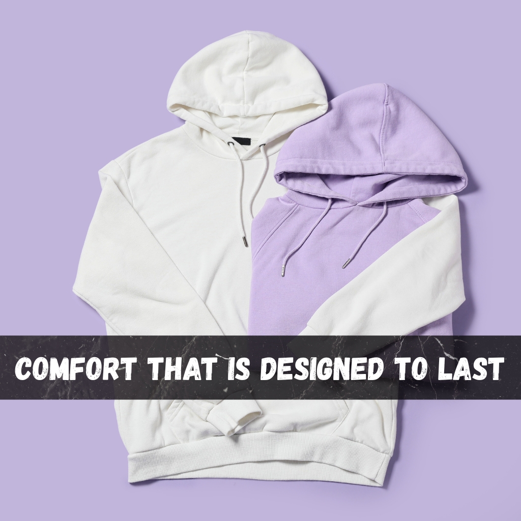 Premium Half-Zip Hoodie for Modern Streetwear Style 4 Two hoodies, white and lavender, neatly stacked on a light purple background with a dark marble banner and white text across the bottom reading 'COMFORT THAT IS DESIGNED TO LAST'.