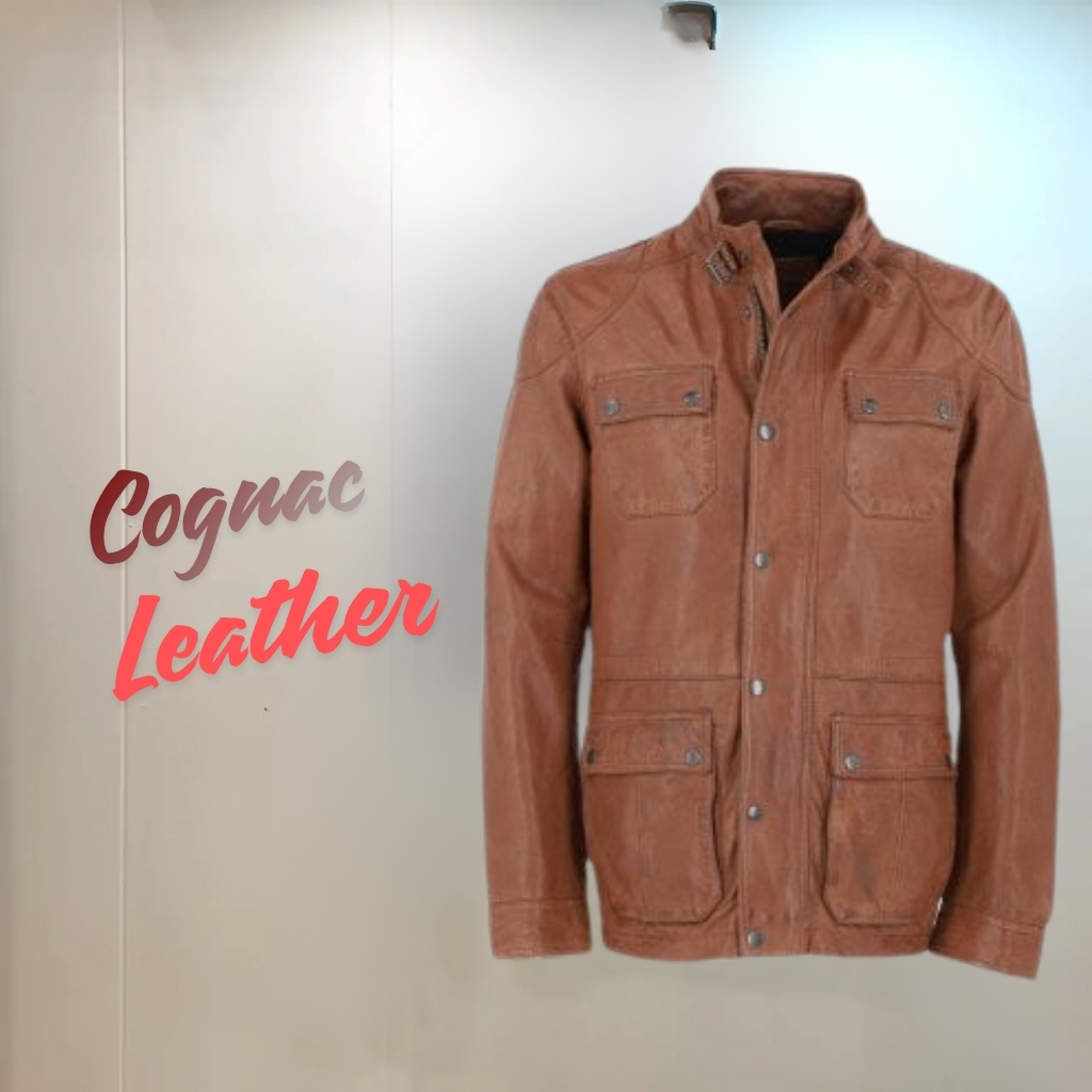 Cognac Leather Jacket Designed for Everyday Style and Comfort 2 A light brown cognac leather jacket hanging against a gradient white-to-light-gray background, featuring two chest pockets and two lower pockets with button closures; the jacket is buttoned up. The text “Cognac Leather” appears to the left.