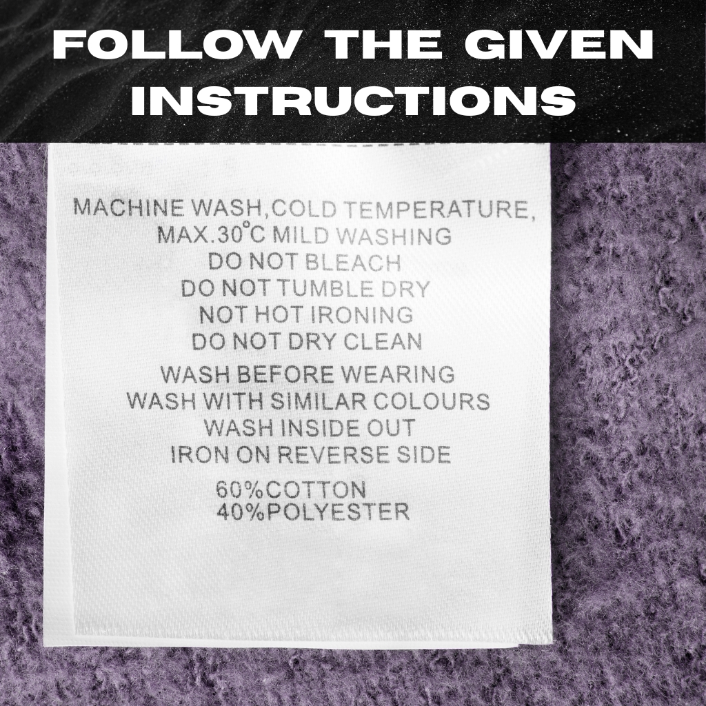 A close-up of a white clothing care tag sewn into a purple knitted garment. The tag, under a heading “FOLLOW THE GIVEN INSTRUCTIONS,” lists washing instructions: machine wash cold at max 30°C, mild wash; do not bleach; do not tumble dry; do not iron hot; do not dry clean; wash before wearing; wash with similar colours; wash inside out; iron on reverse side. Fabric composition: 60% cotton, 40% polyester.

