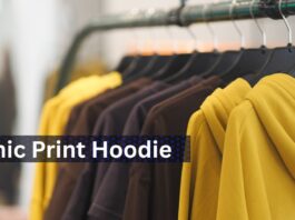 Graphic Print Hoodies: Ultimate Streetwear Guide A rack of hoodies on black hangers, with a bright yellow hoodie in the foreground and blurred yellow and brown hoodies in the background.