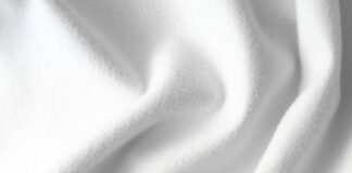 Polar Prime Fabric Guide: Comfort, Durability & Performance Alt text: Close-up of white plush fabric with soft, flowing folds and gentle highlights and shadows. Polar Prime Fabric Guide: