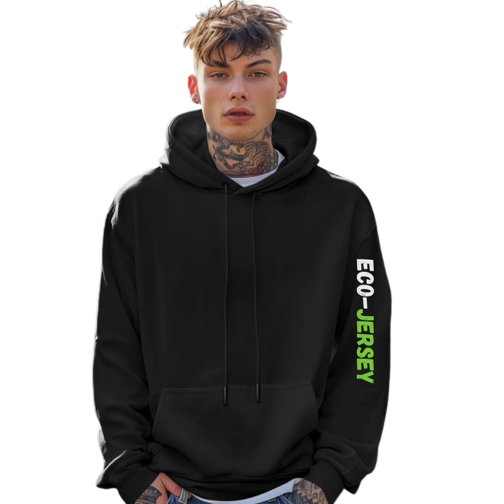 Logo Graphic Hoodie: Trendy Streetwear Style Guide 5 A light-skinned man with visible neck and arm tattoos wearing a black hoodie with bright green text "ECO-JERSEY" down the right sleeve, standing against a bright white background.