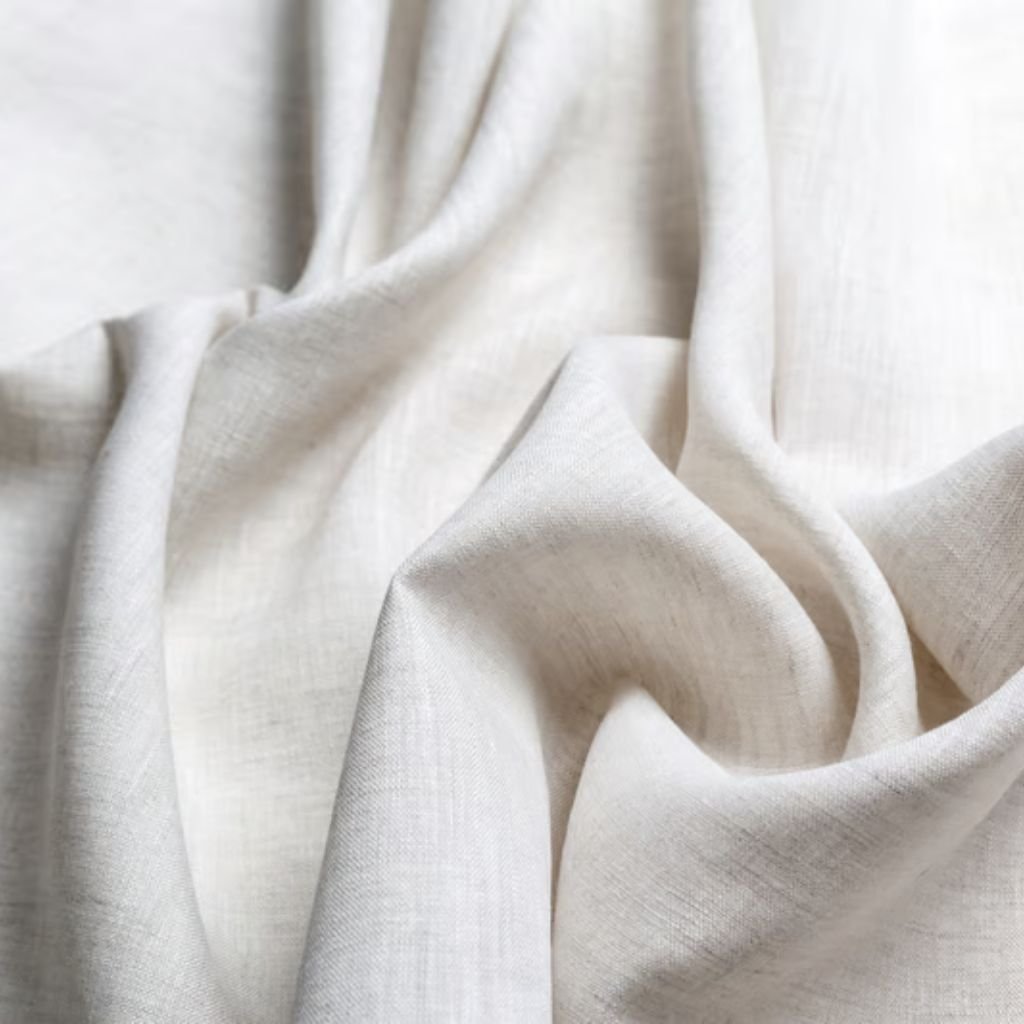 Snow Silk Winter Fabric: The Future of Cold-Weather Comfort 9 Alt text (short, screen-reader friendly): Close-up of a soft, light beige fabric with flowing folds and gentle shadows.
Snow Silk Winter Fabric: