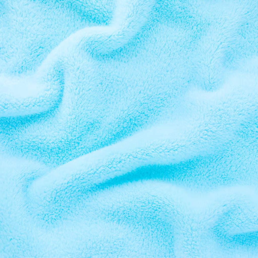 Cloud Fleece Winter Fabric: The Ultimate Soft & Warm Choice 1 Alt text (short, descriptive): A close-up of a light blue, fluffy blanket or towel with soft folds and subtle shadows.
Cloud Fleece Winter Fabric: