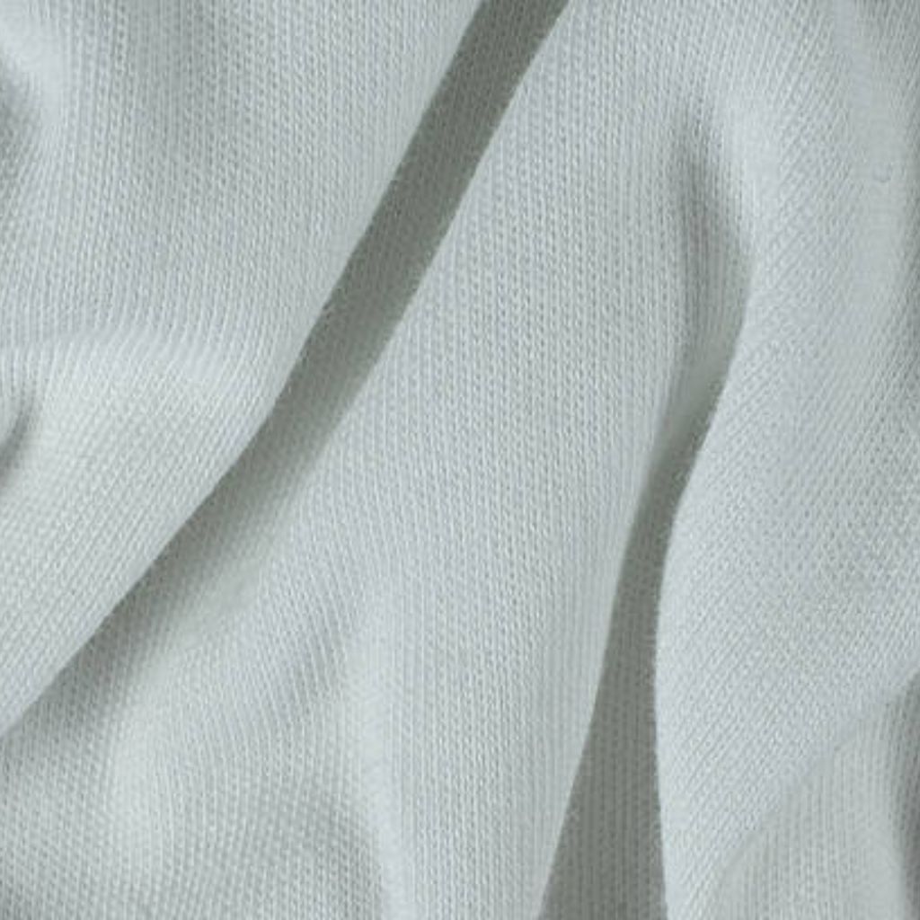 Ice Glow Comfort Weave Fabric: Softness, Warmth & Durability 8 Alt text: Close-up of soft light blue or gray knitted fabric, showing folds and shadows that highlight the tight knit texture.
Ice Glow Comfort Weave Fabric: