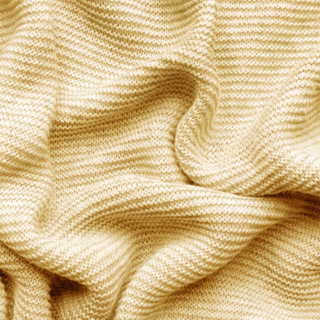 Alt text (short, screen-reader friendly): Close-up of soft beige fabric with a ribbed or ribbed-texture, showing gentle folds and warm lighting.
What Is Heat Wave Wool Blend?

