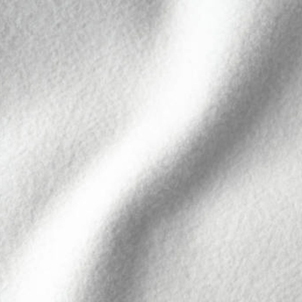 Alt text: Close-up of white fleece fabric with soft texture and subtle light-and-shadow variations suggesting folds.

Polar Prime Fabric Guide: