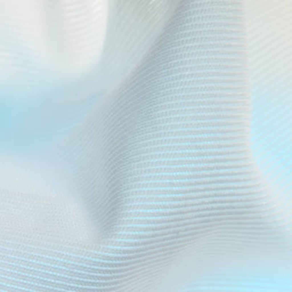 Ice Glow Comfort Weave Fabric: Softness, Warmth & Durability 6 Alt text: Close-up of textured white fabric with a soft, flowing drape that fades into pale blue in some areas.Ice Glow Comfort Weave Fabric: