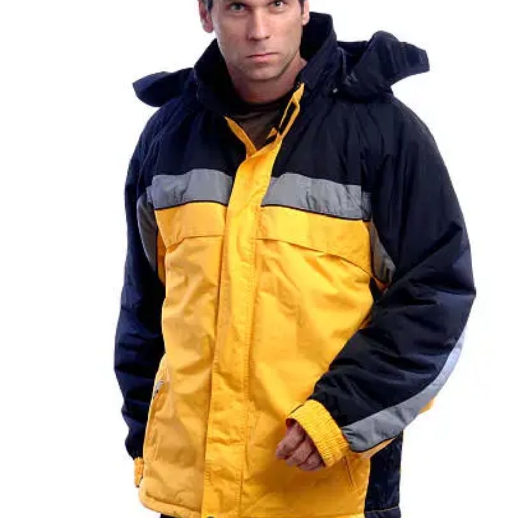Alt text: A man stands against a white background wearing a color-blocked yellow and black jacket with gray stripes across the chest and arms; he has a serious expression and looks at the camera.

Storm-Guard Winter Coat: