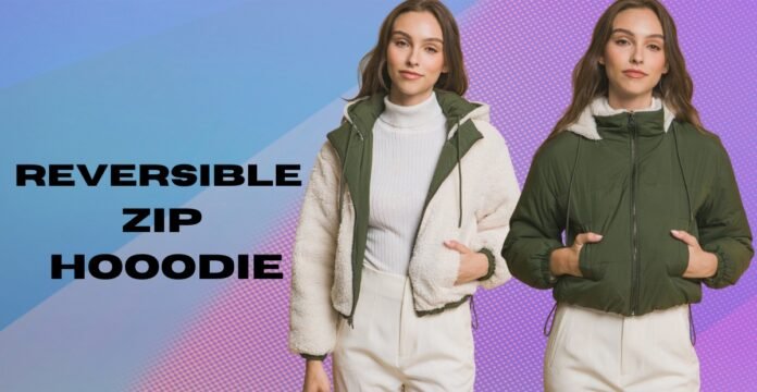 Two women model a reversible zip hoodie, showing the white fleece interior with green trim on the left and the green exterior on the right. The left woman wears a white turtleneck and off-white pants; the right woman has hands in pockets. The background features a blue-to-purple gradient with a halftone pattern.
