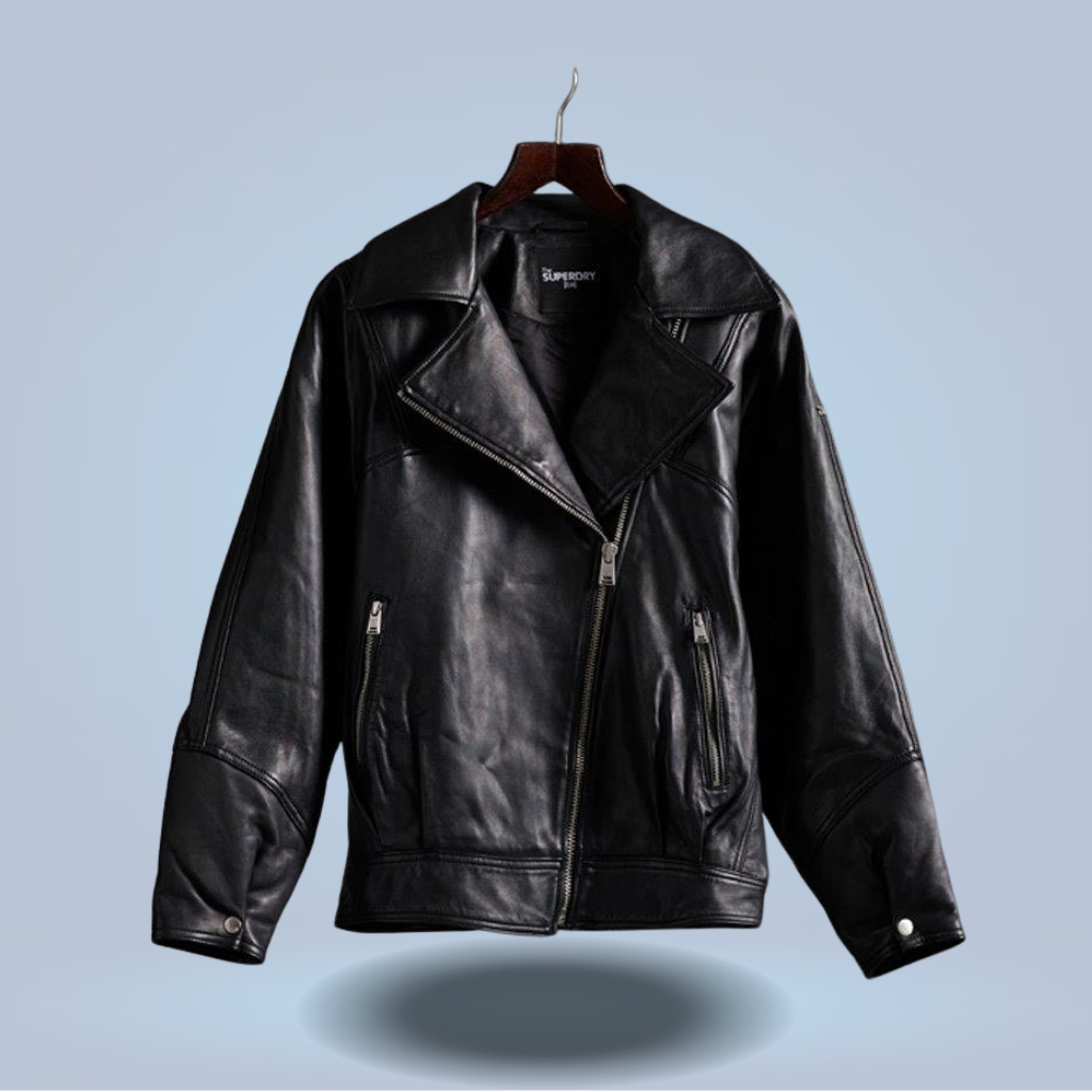 :
Black hybrid leather jacket featuring quilted sleeves and matte panels, with zippered front.