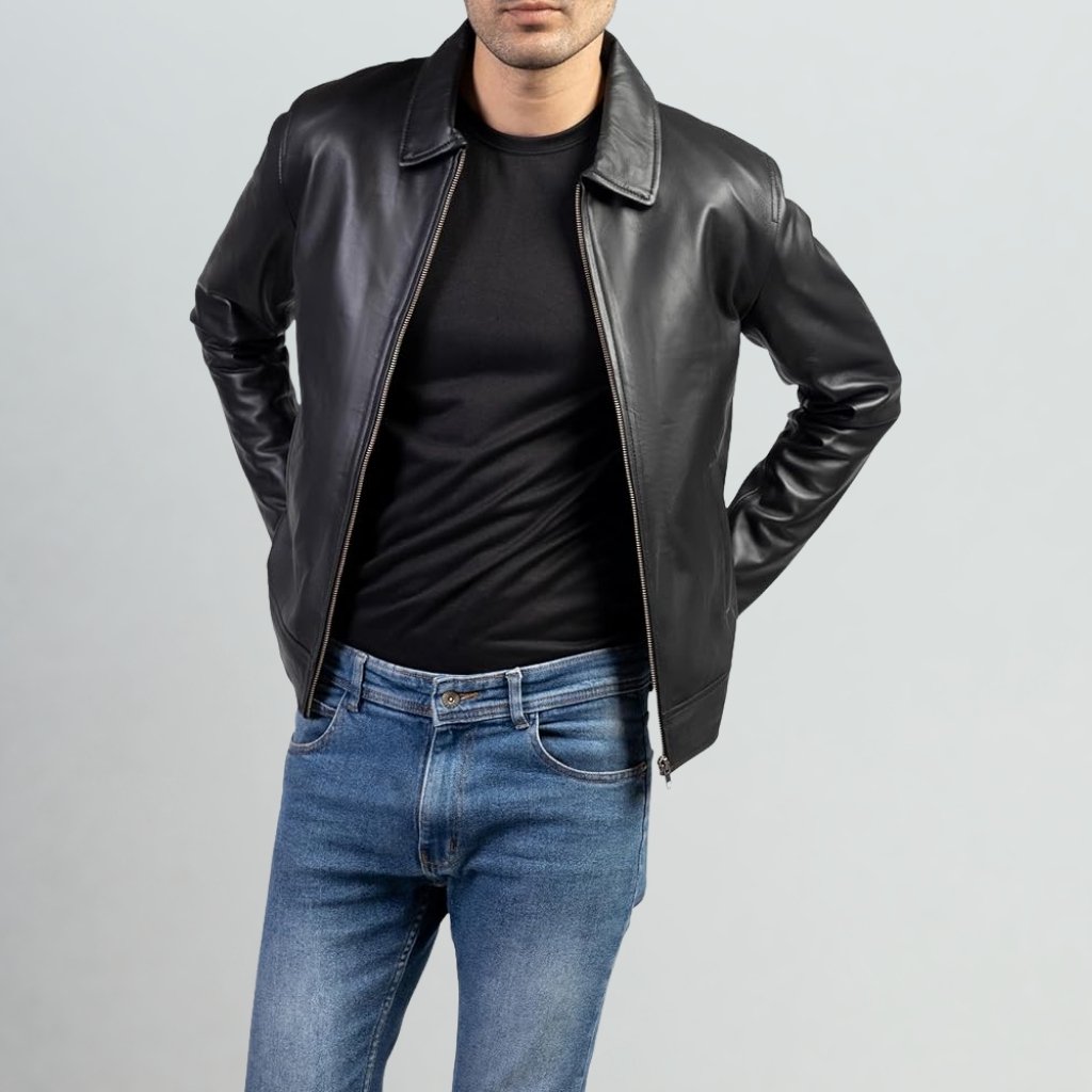 Everyday Leather Jacket – Timeless Comfort and Style for Daily Wear 6 A sleek, black leather biker jacket with silver hardware, notch lapels, asymmetrical zip closure, zippered cuffs, and quilted shoulders, displayed on a hanger against a white background.
