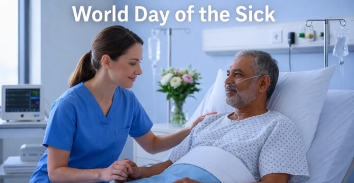 A nurse in blue scrubs sits beside an elderly male patient in a hospital bed, holding his hand. The patient wears a nasal cannula and looks at the nurse; medical equipment and flowers are visible in the background, with a banner promoting World Day of the Sick.