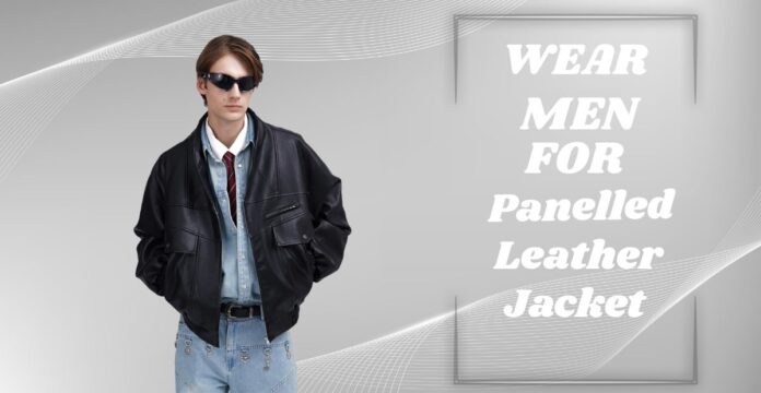 A man wearing a black leather jacket, light blue denim shirt, red tie, blue jeans, and sunglasses stands against a gray background with white curved lines and a framed panel displaying the text “WEAR MEN FOR Panelled Leather Jacket.”