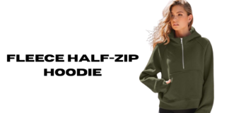 Why a Fleece Half-Zip Hoodie Is a Winter Wardrobe Essential A woman wearing a dark olive green fleece half-zip hoodie with a front pocket, standing against a transparent background.