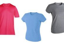 Sports Shirts and Athletic Tops: Ultimate Workout Wear Guide A white background displaying three short-sleeve t-shirts in a row: a vibrant pink t-shirt with a V-neck on the left, a light blue t-shirt with a round neckline in the middle, and a gray t-shirt with a round neckline on the right. Each shirt is unwrinkled and appears to be for sale. Sports Shirts and Athletic Tops: