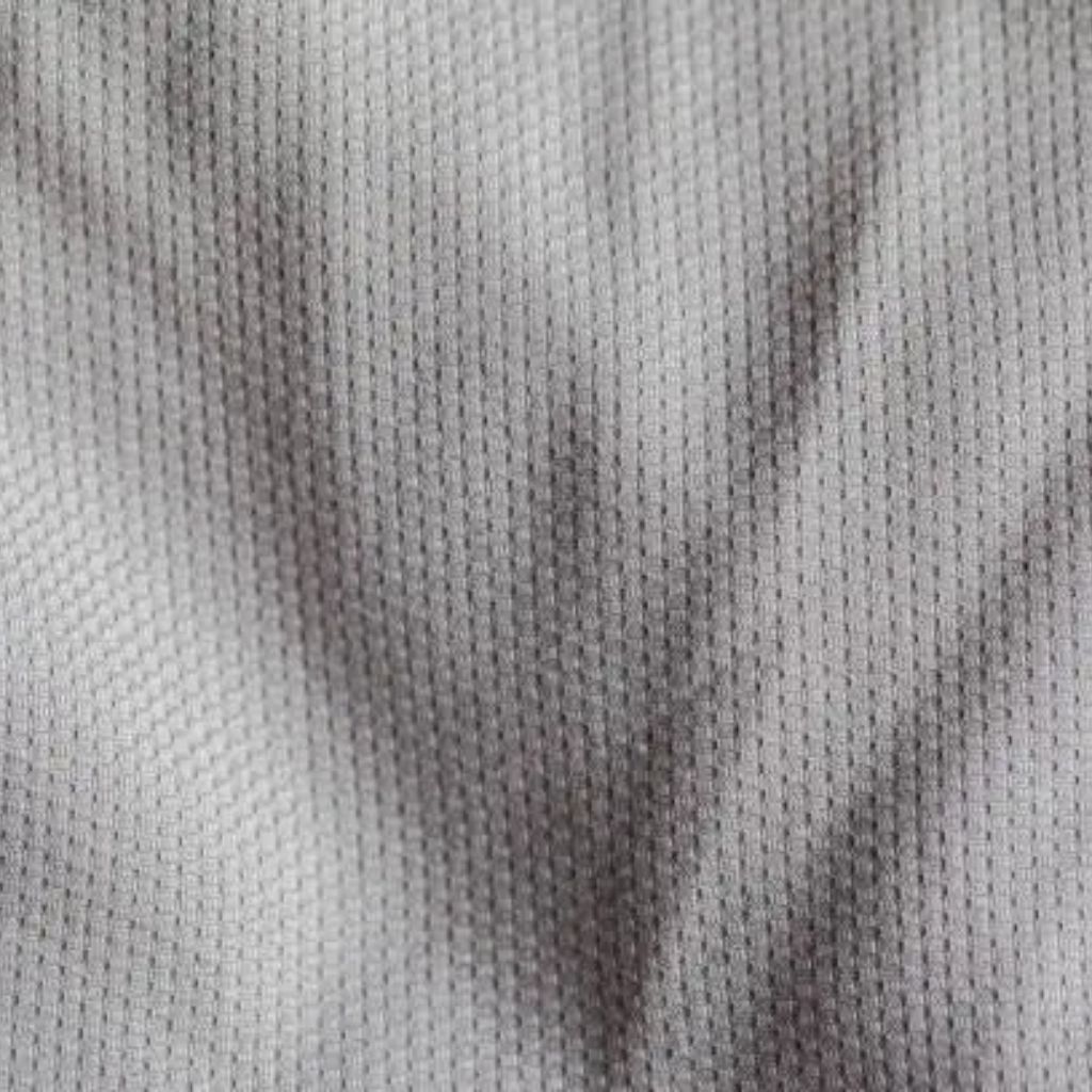 “Close-up of light gray fabric with a subtle dotted texture, typical of a warm, military-inspired winter jacket.”

Rapid Dry Sports Fabric: