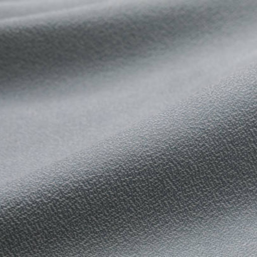 Glacier Dry Performance Fabric: Stay Cool, Dry & Game-Ready 11 Close-up of soft grey performance fabric with fine smooth weave and gentle foldsGlacier Dry Performance Fabric: