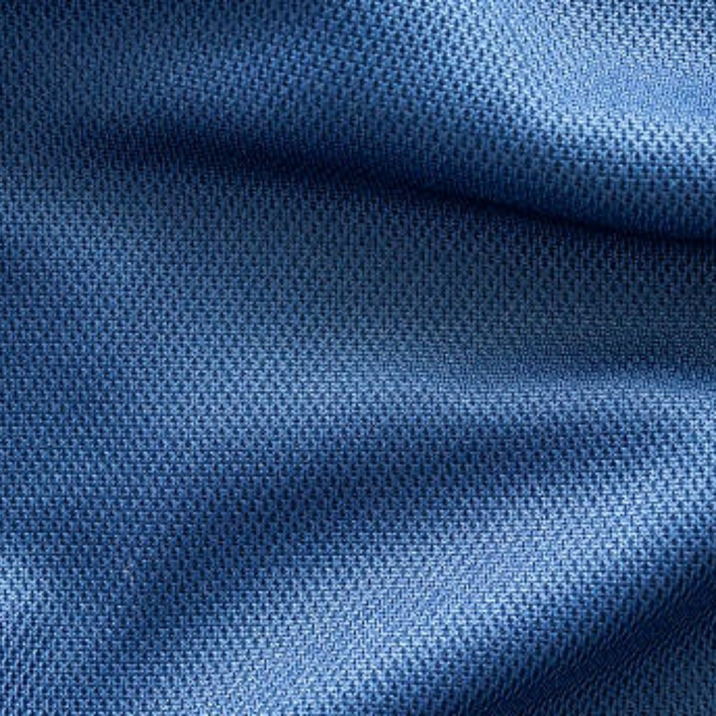 "Close-up of deep blue mesh fabric with fine, uniform weave, subtle folds, and three-dimensional texture showing light variations."

Quantum Dry Sports Fabric