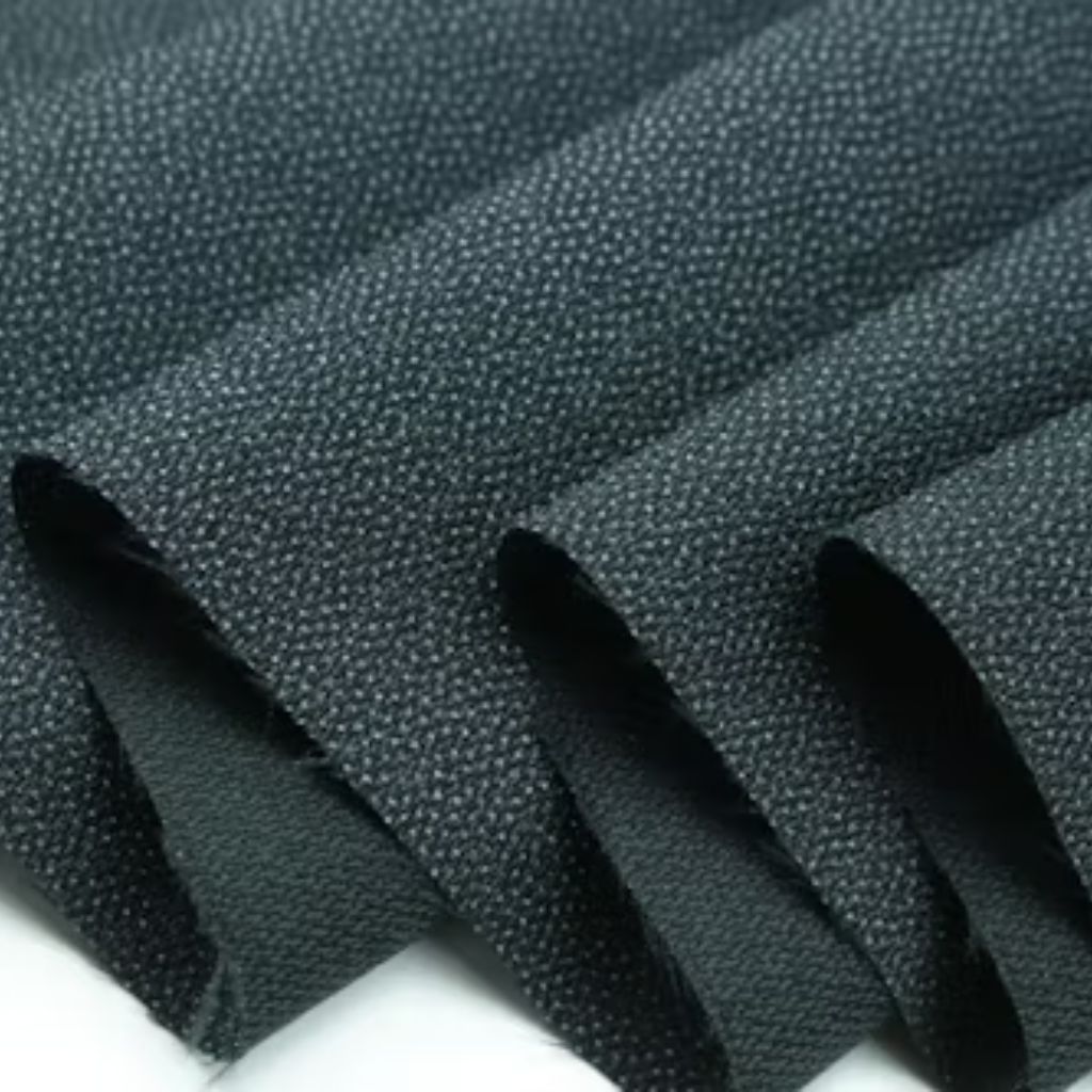 Dark gray napped winter fabric with soft folds and fine raised texture, evoking warmth and durability.

(Character count: 94 — fits within most CMS alt field limits and avoids redundancy with surrounding content.)Air Weave Performance Fabric: