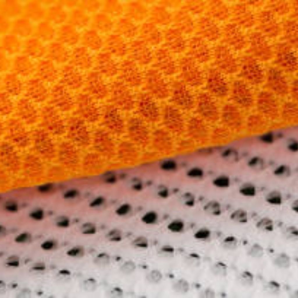Close-up of two mesh fabric layers: an orange top layer with a small hexagonal pattern and a white bottom layer with larger holes forming a grid-like pattern.
Cool Max Air Flow Mesh Fabric: