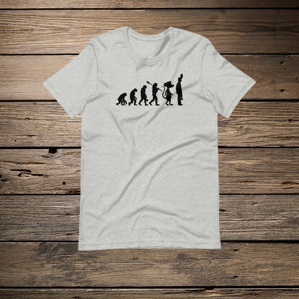 What Is a T-Shirt , Types and Style Guide 9 White T-shirt on a wooden table featuring a black “evolution of people” silhouette graphic.