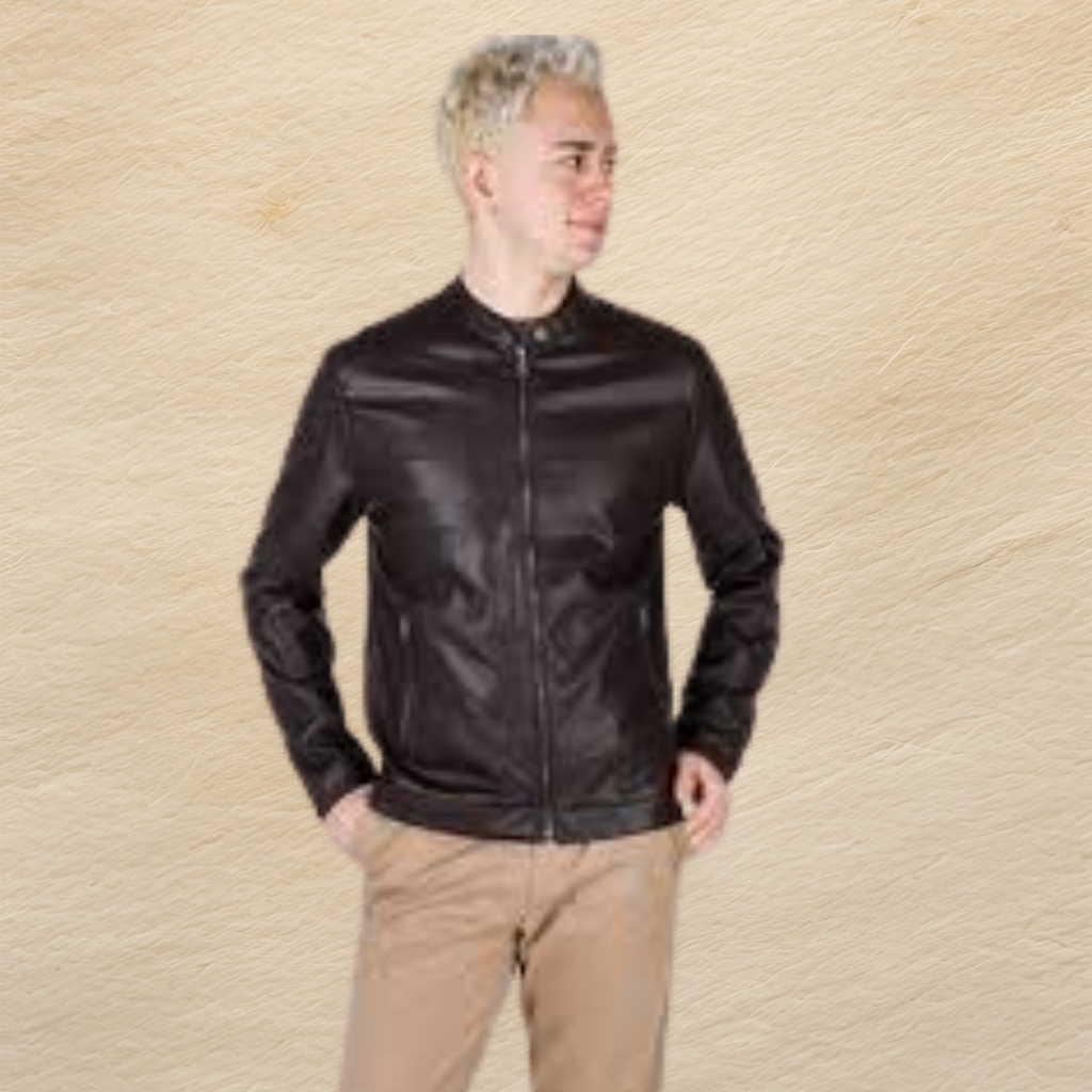 Eco Leather Jacket Crafted for Sustainable Modern Style Wear 5 A man with blond hair wearing a dark brown leather jacket and tan pants stands with his hands in his pockets, looking to his left, against a beige textured background.