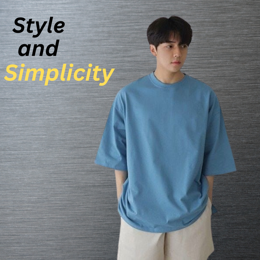Smart Casual T-Shirt – Premium Comfort & Stylish Everyday Look 8 Smart casual men’s t-shirt in a clean blue tone worn by a model, styled with light trousers against a textured gray background.