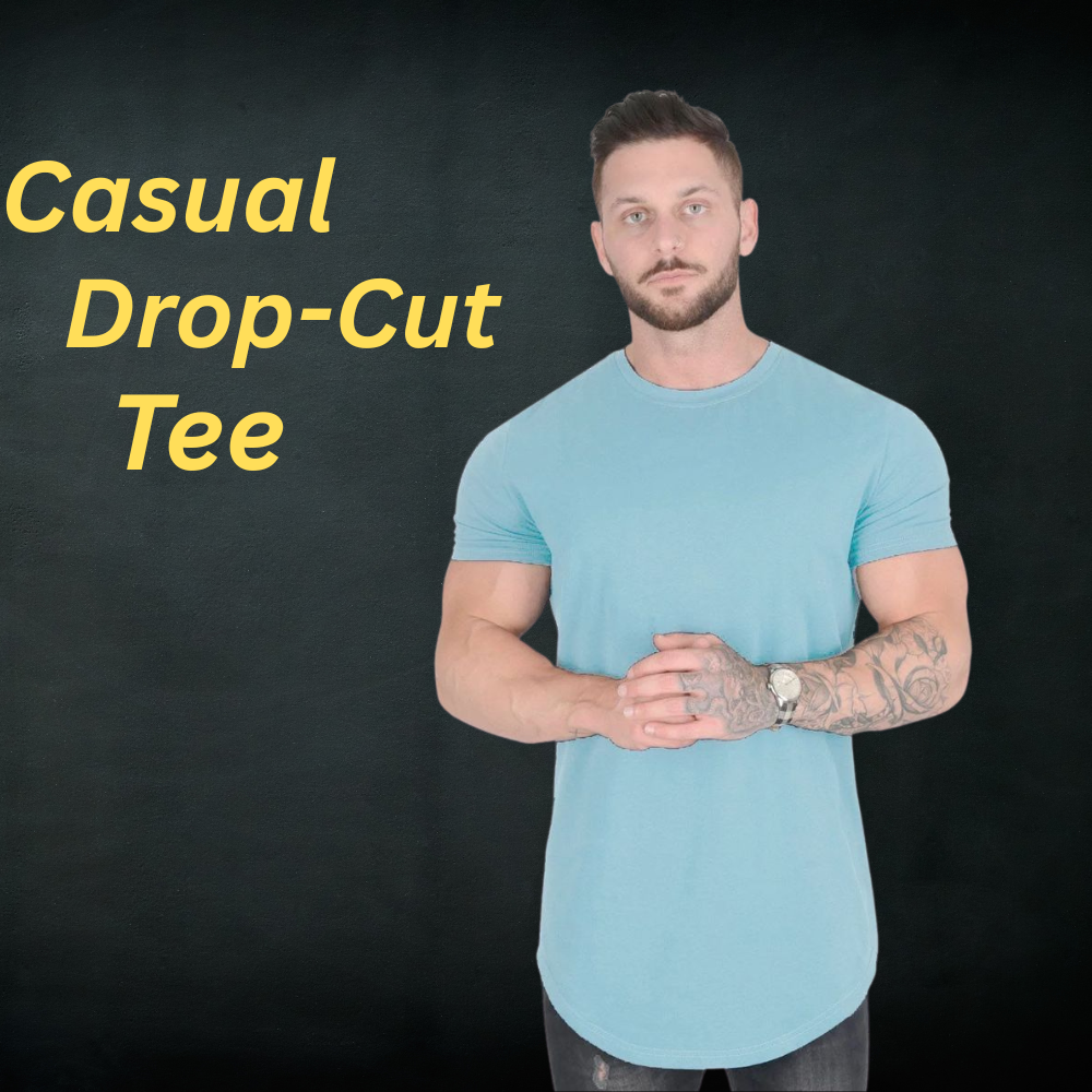 Casual Drop Cut Tee – Lightweight & Stylish Everyday Wear 13 Casual drop-cut tee in light blue on a model, featuring a relaxed everyday silhouette.