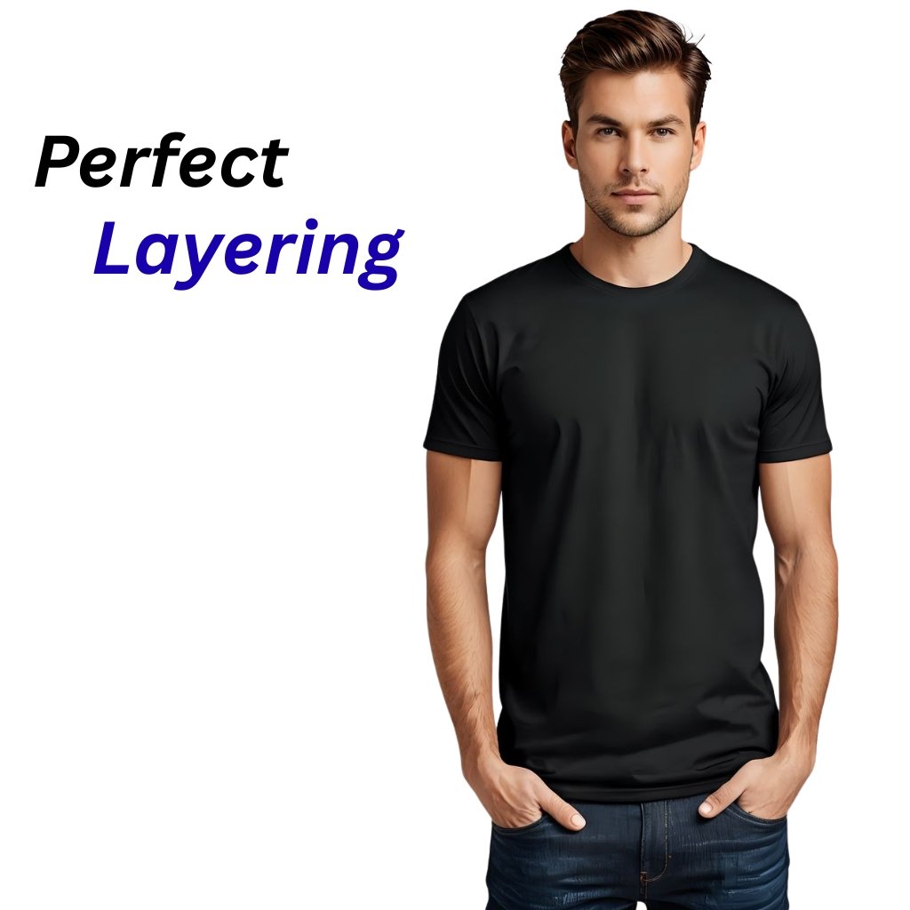 “Model wearing a black regular fit crew-neck T-shirt on a white background, highlighting perfect layering for everyday style.”