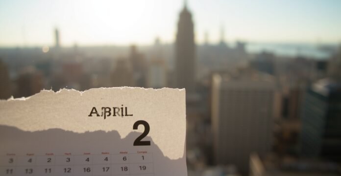 A close-up of a calendar page showing April 2, with the number “2” large in the center and the date grid visible. International Days on April 2