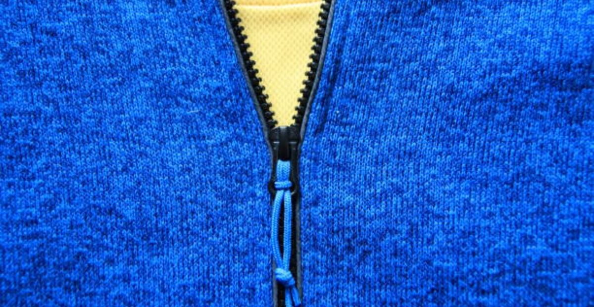 Aqua Lock Sports Knit: Revolutionizing Sportswear Technology Close-up of a blue textured winter coat fabric showing a partially unzipped black zipper, revealing yellow thermal lining underneath. ✅ Why this works: Starts with purpose (“close-up”) and key visual hierarchy (blue fabric → zipper → yellow lining) Specifies color and texture (“blue textured”, “black zipper”, “yellow thermal lining”) — critical for product differentiation and accessibility Avoids subjective language (“stylish”, “premium”) and redundant terms (“photo of”, “image shows”) Under 125 characters (118), ideal for assistive tech.Aqua Lock Sports Knit: