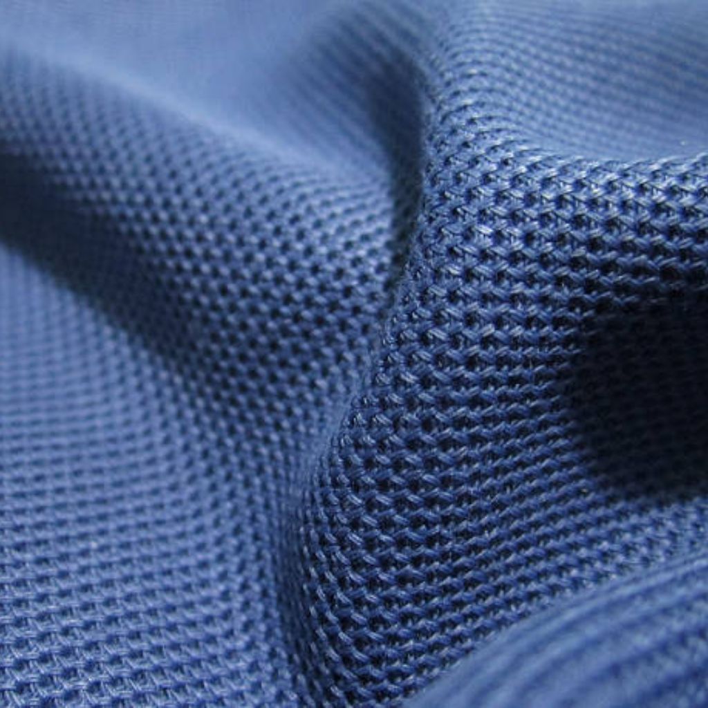 "Blue technical fabric with a uniform raised net-like pattern; folds create dimensional shadows and highlight 3D texture for breathability."
Infinity Cool Tech Knit:
