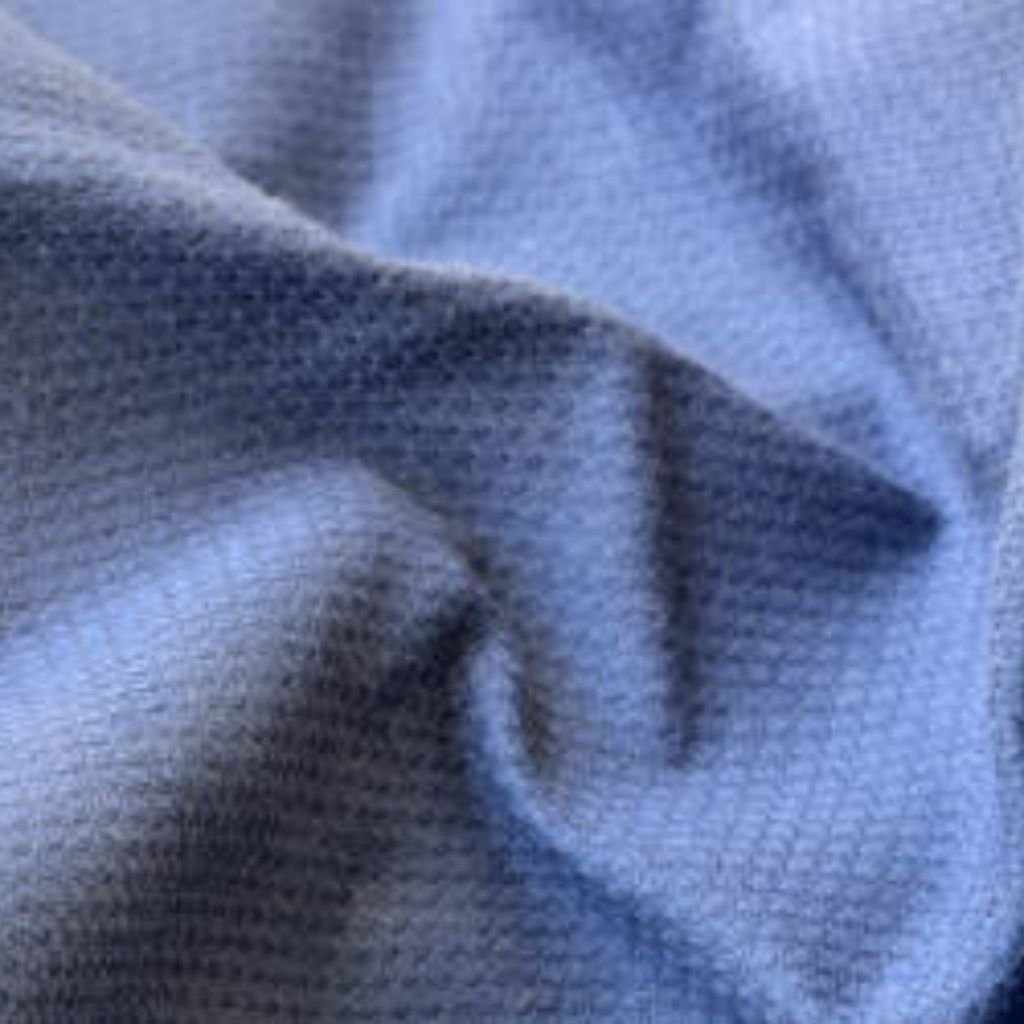 Rapid Dry Sports Knit: Train Hard, Stay Dry, Perform Better 10 Blue woven fabric with raised diamond-pattern texture and subtle micro-ribbing, showing depth through soft folds and tonal variation.
Rapid Dry Sports Knit: