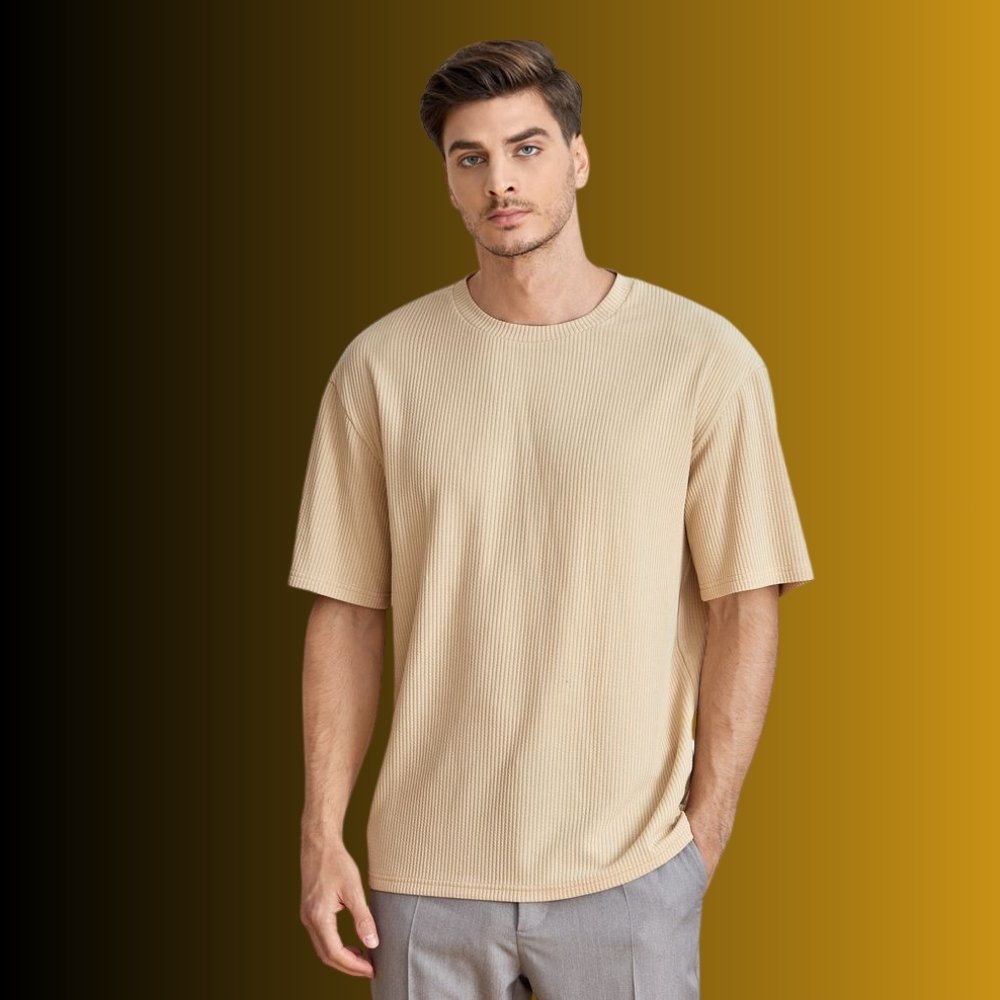 Trendy Men’s Longline T-Shirts – Effortless Style and Everyday Comfort 7 Beige longline T-shirt with a crew neck and short sleeves, draping straight down with a longer hem.