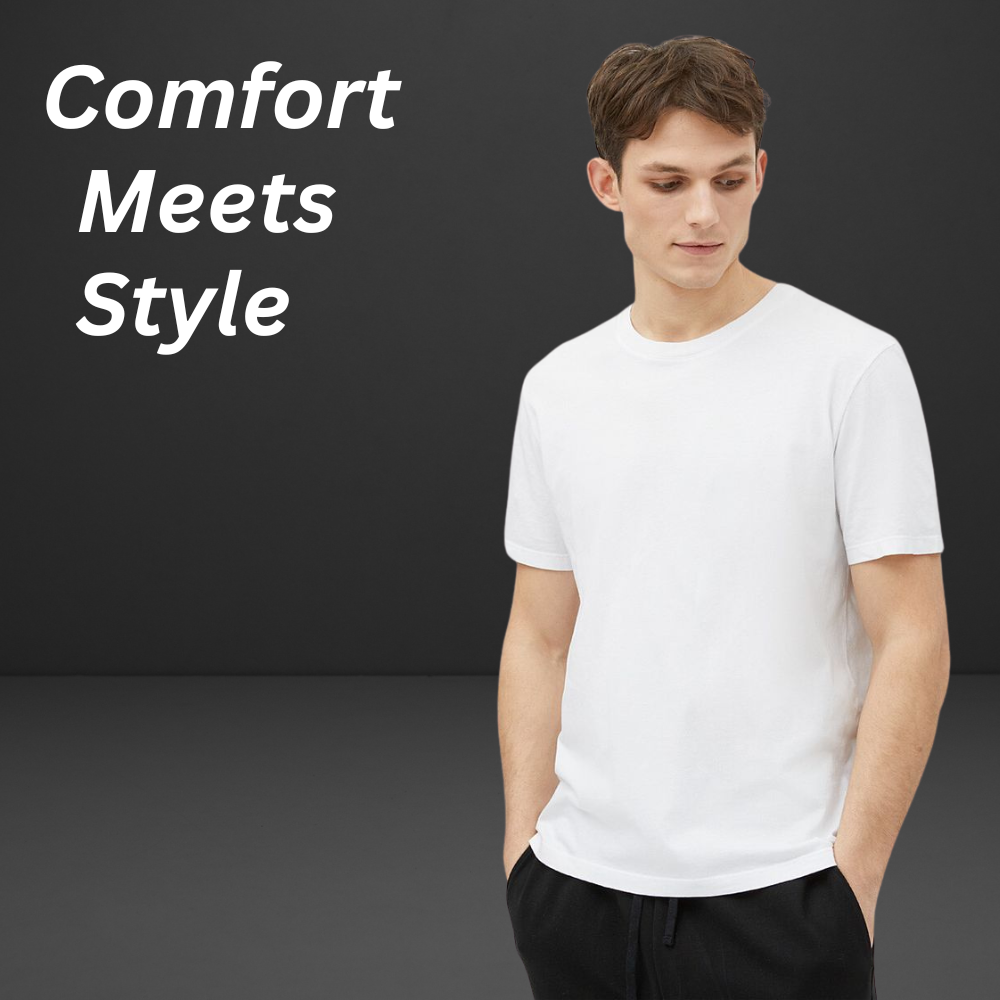 Modern Drop Shoulder Tee – Minimal Streetwear Look 11 Minimal streetwear drop-shoulder t-shirt in a clean solid white color, styled on a model against a dark background.