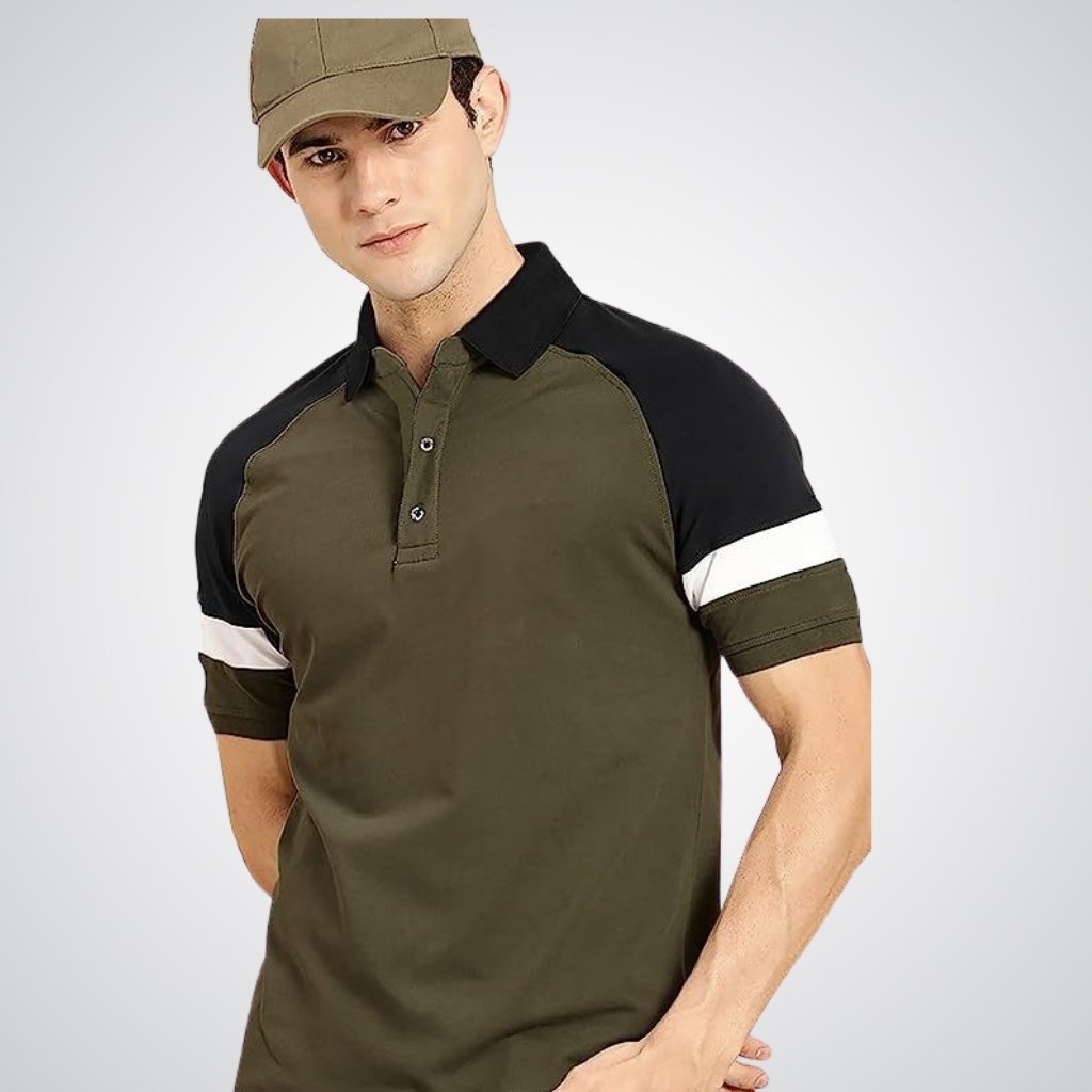 Styling a half-sleeve polo T-shirt with a casual sporty look featuring a cap and olive/black color-block design.

