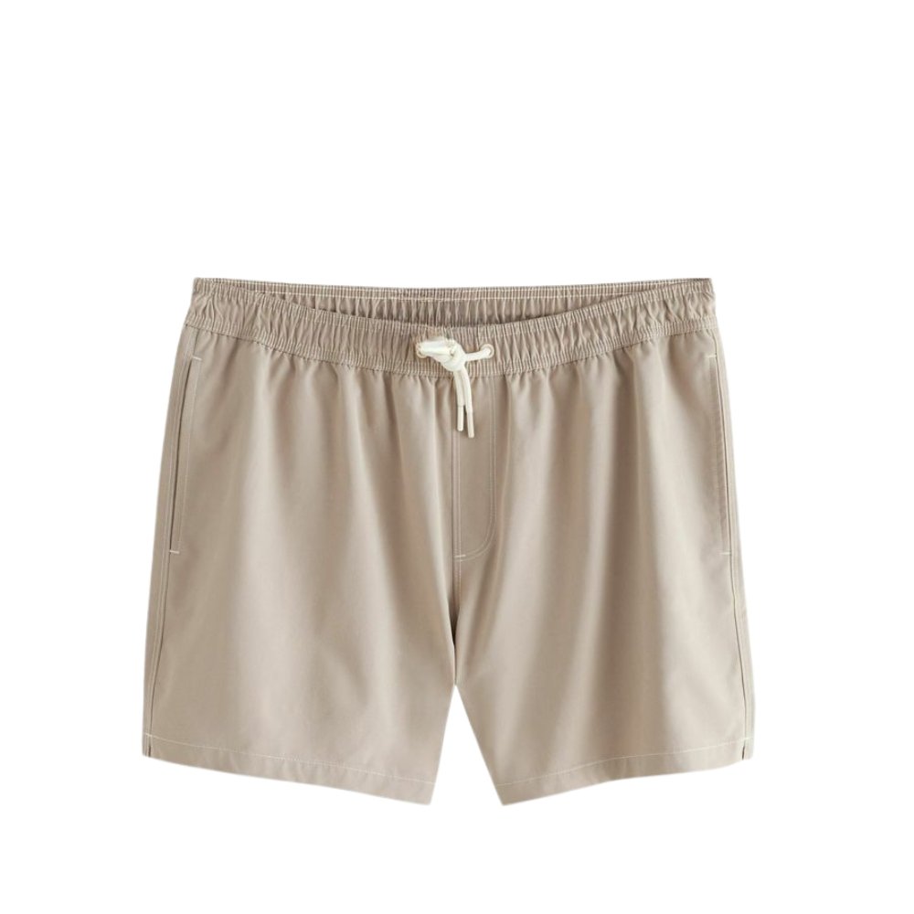 Casual Beachwear Essentials: Stylish Swim Shorts 12 Beige swimwear shorts with an elastic waistband and adjustable white drawstring, featuring side seam pockets.