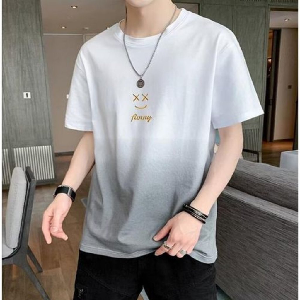 Man wearing a white graphic t-shirt with a relaxed fit, showing everyday comfort and ease of movement.

