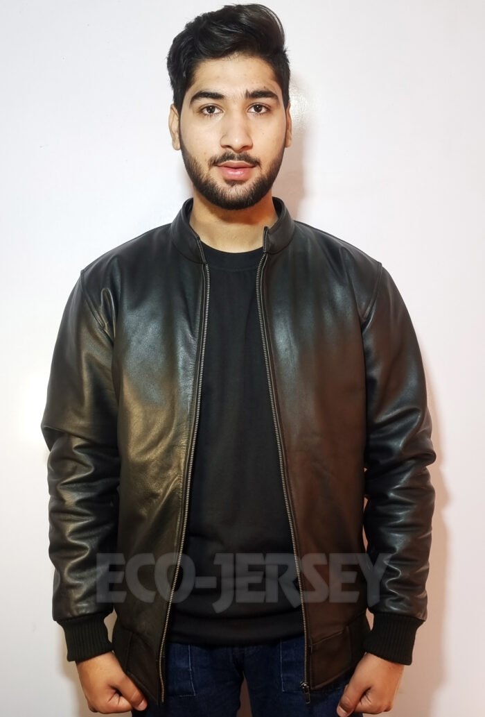 Man wearing black bomber leather jacket in front side pose showing fit and style