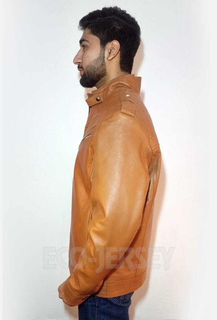 A young man in a brown leather jacket with quilted shoulders and a high collar is shown in profile.